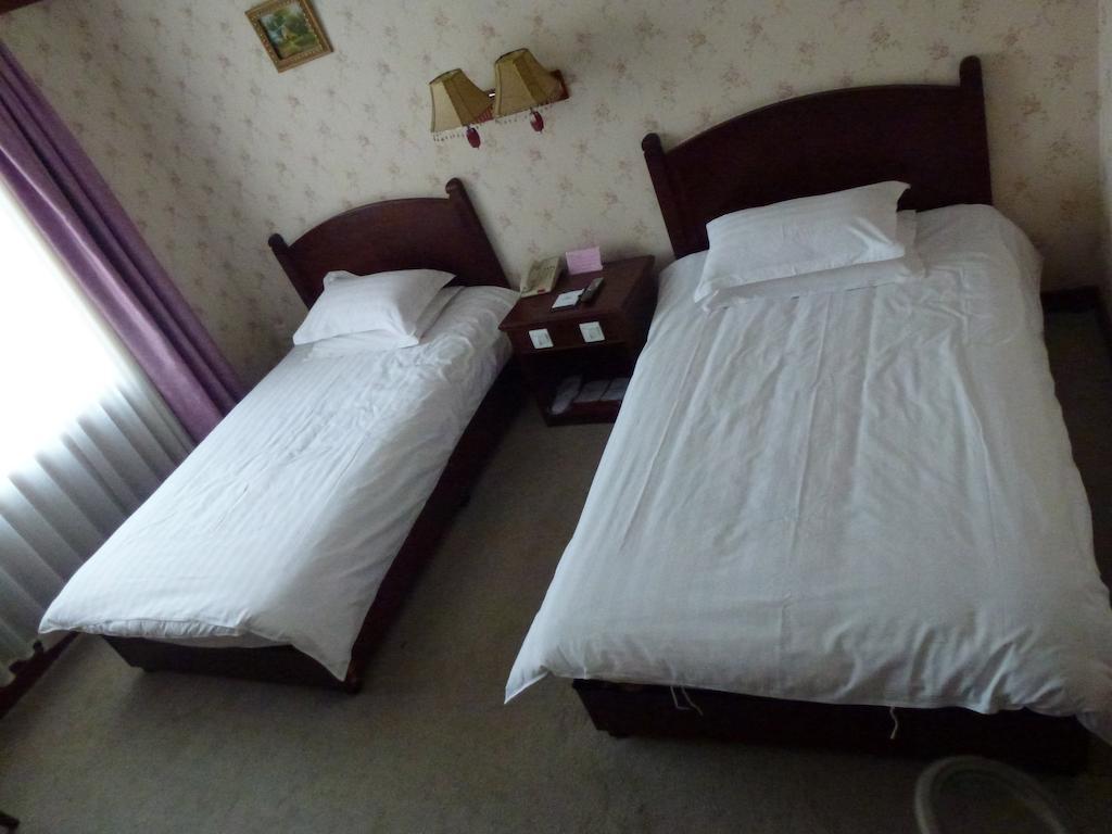 Hotel Harbin Volgamanor Acheng Habitación foto