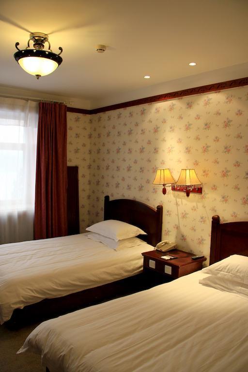 Hotel Harbin Volgamanor Acheng Habitación foto